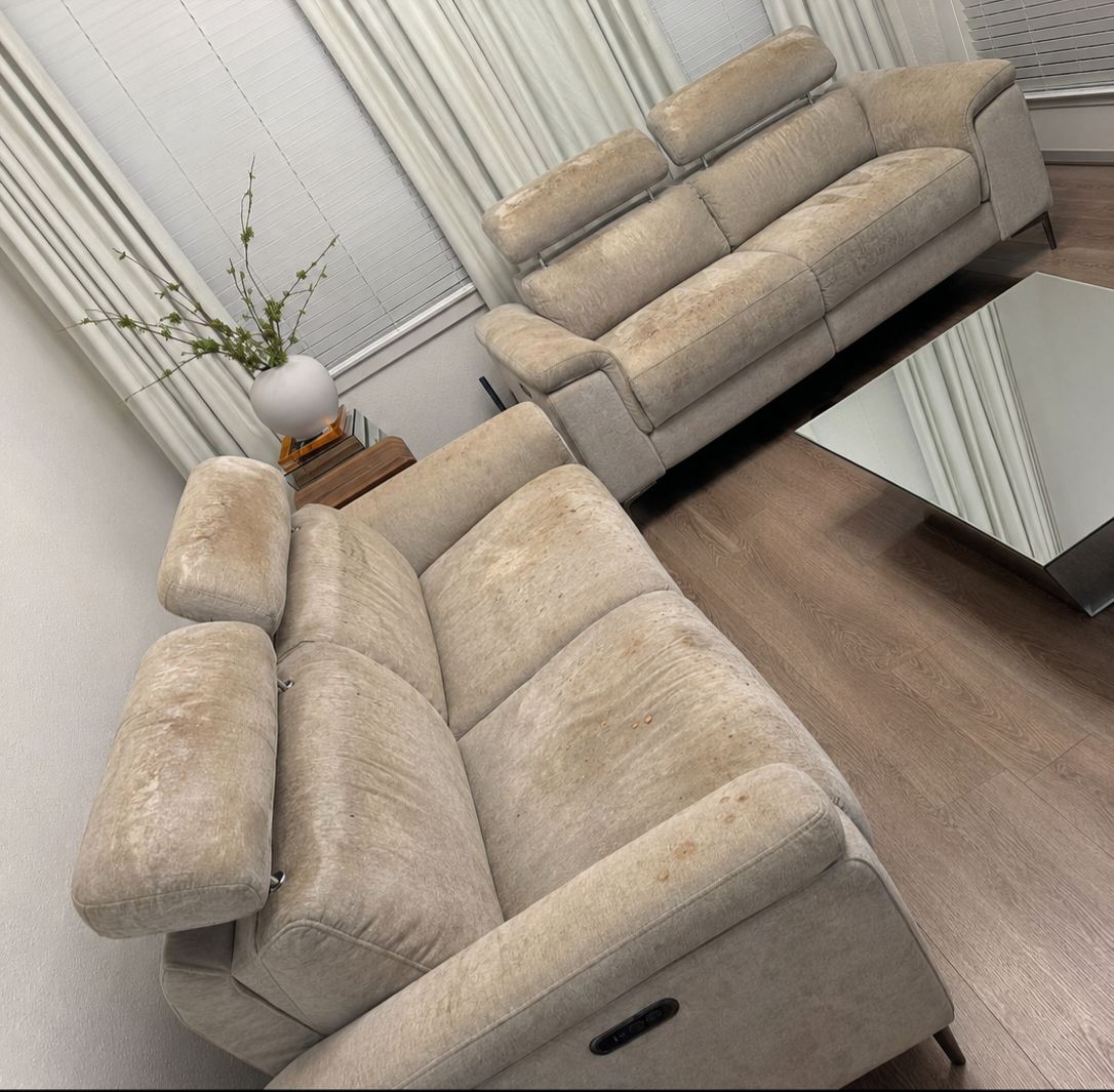 Beige reclining sectional before cleaning